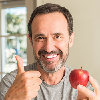 Middle age man eating healthy